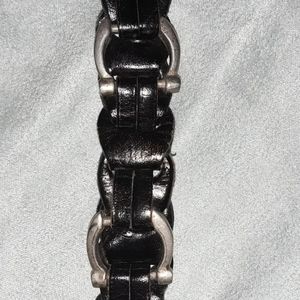Black leather woven belt horseshoe silver detail